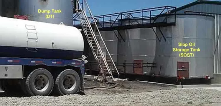 Crude oil tank bottom storage tanks at oil recovery site showing dump tank and slop oil storage tank