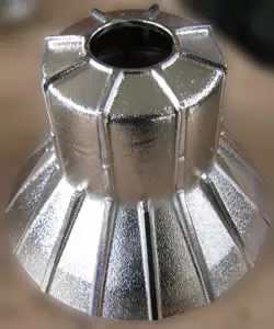 Disc centrifuge top disc - dome-shaped collection cover at top of disc stack